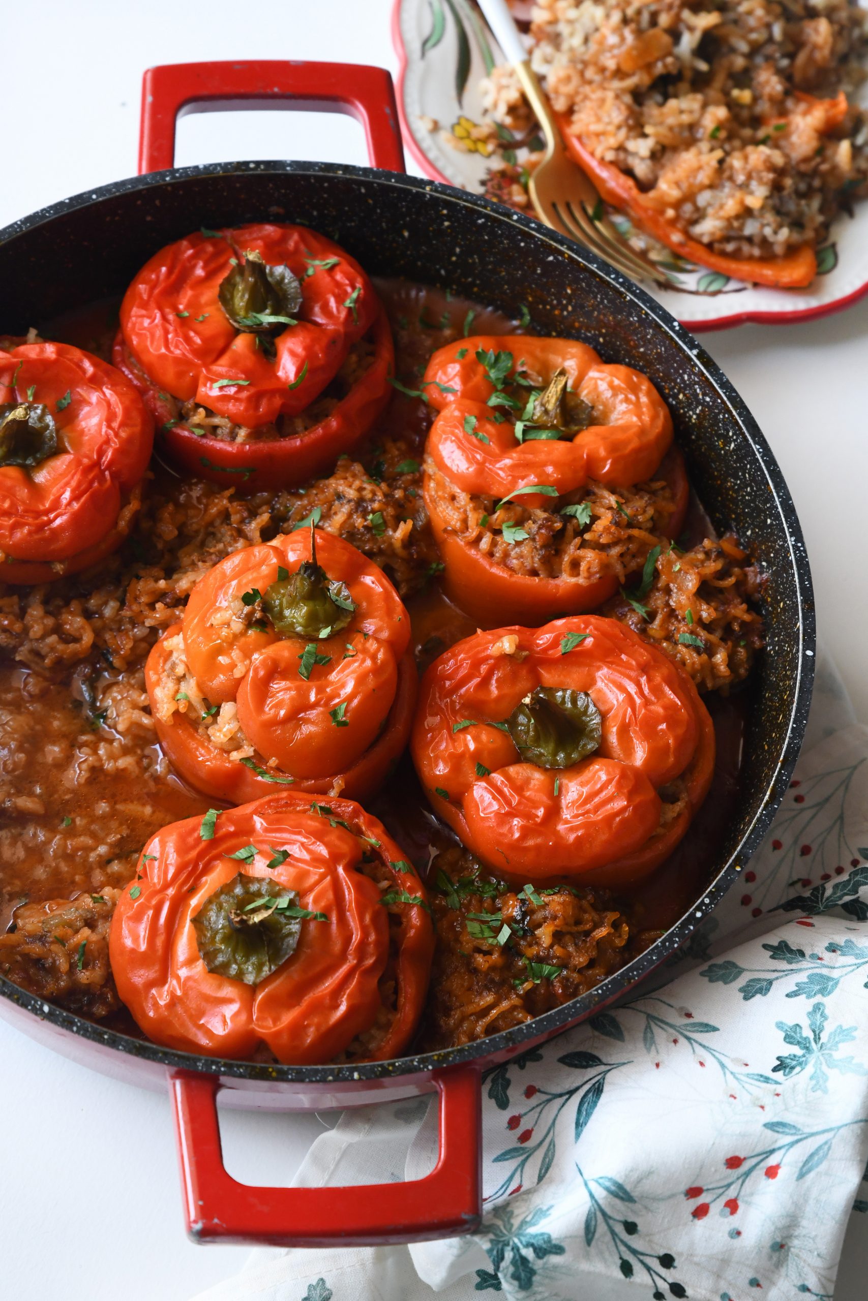 Meat and Rice-Stuffed Peppers in Tomato Sauce