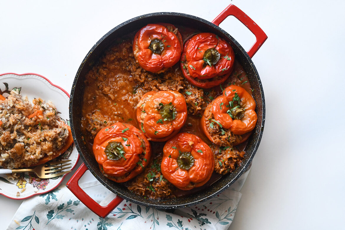 Meat and Rice-Stuffed Peppers in Tomato Sauce