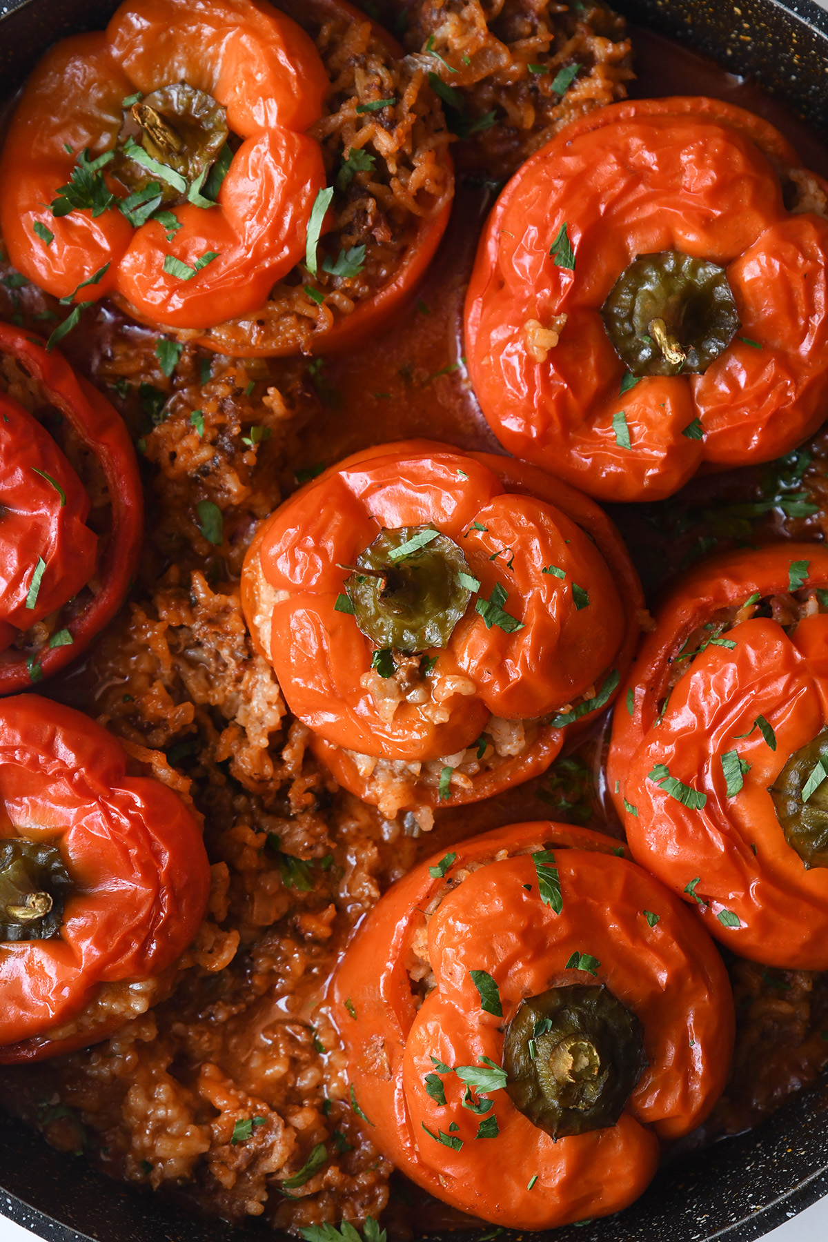 Meat and Rice-Stuffed Peppers in Tomato Sauce