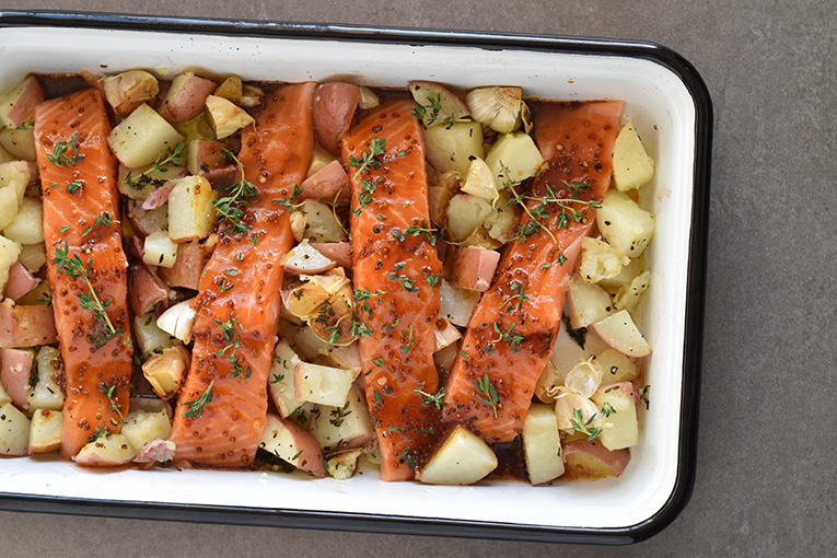 Oven-Baked Salmon and Potatoes in a Mustard Silan Sauce