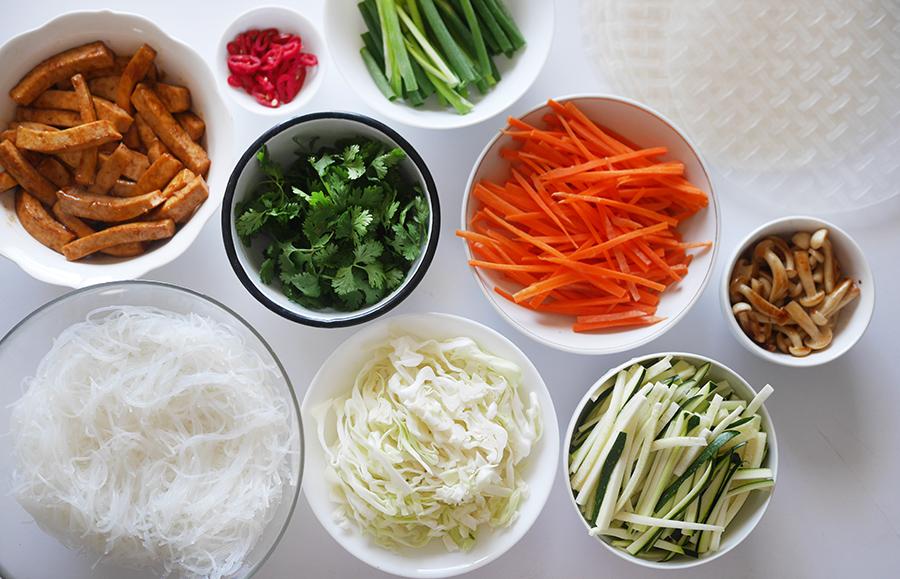 Place all of the vegetables and toppings on the table and each person assembles their own!